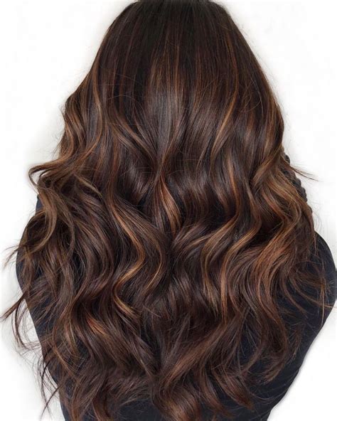 caramel foils on dark brown hair|dark brown hair with caramel.